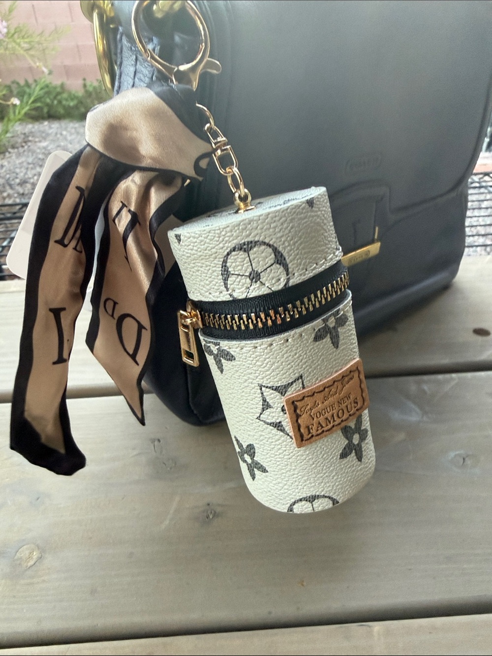 Vogue Ivory and Black Monogram Cylinder Keychain Pouch - Picture 2 of 7